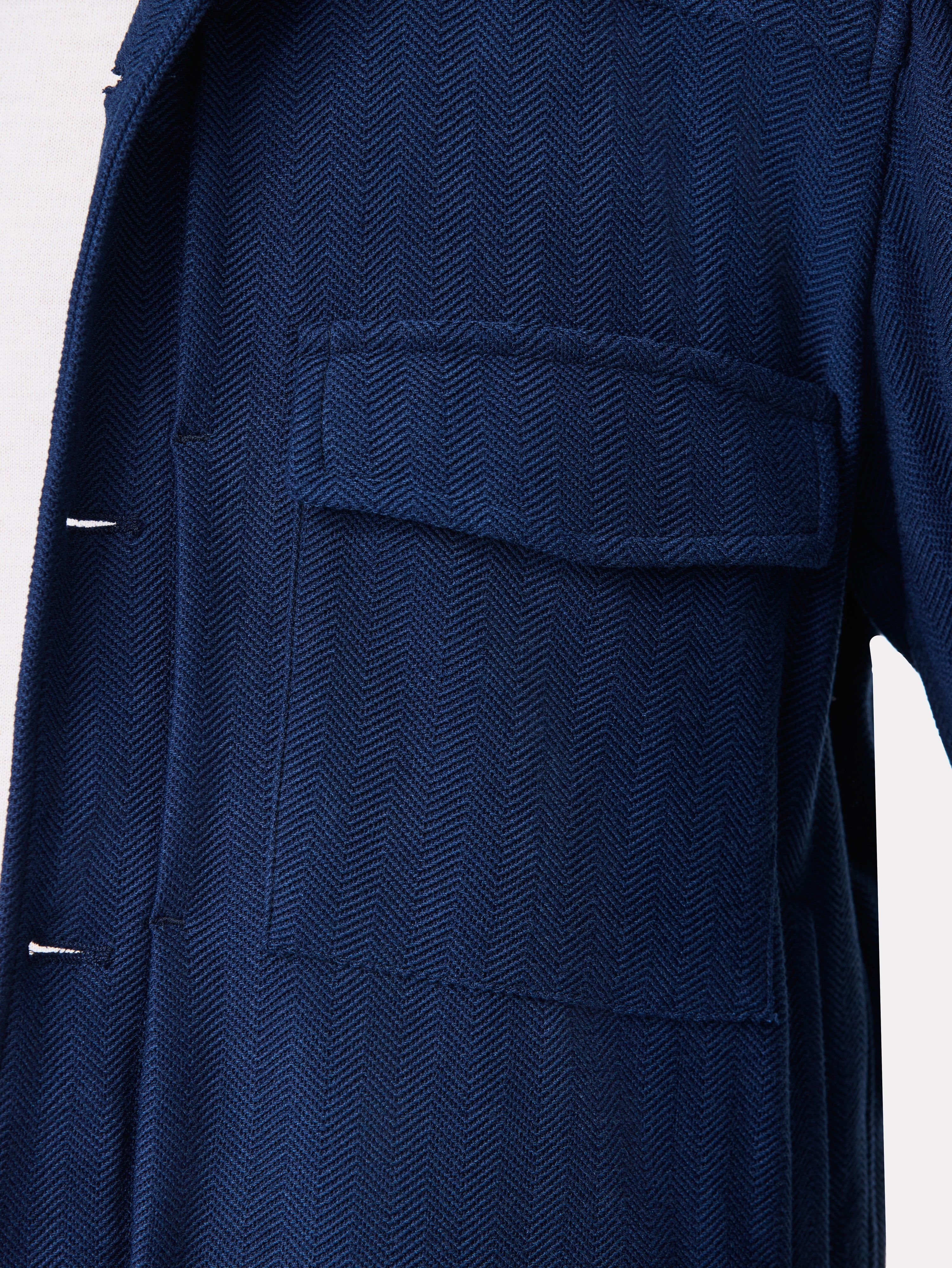 Short navy jacket with patch pockets