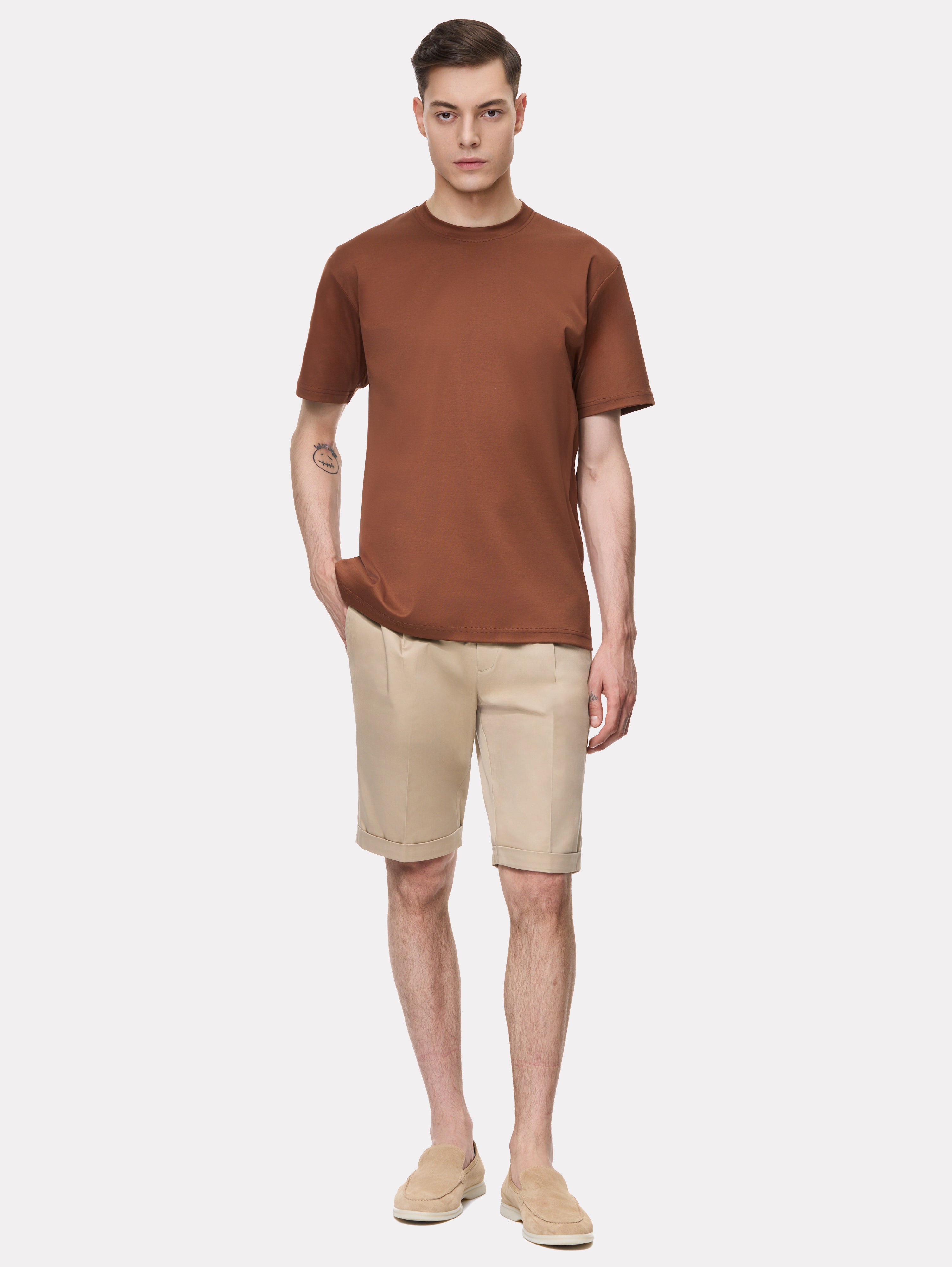 Beige shorts with cuffs