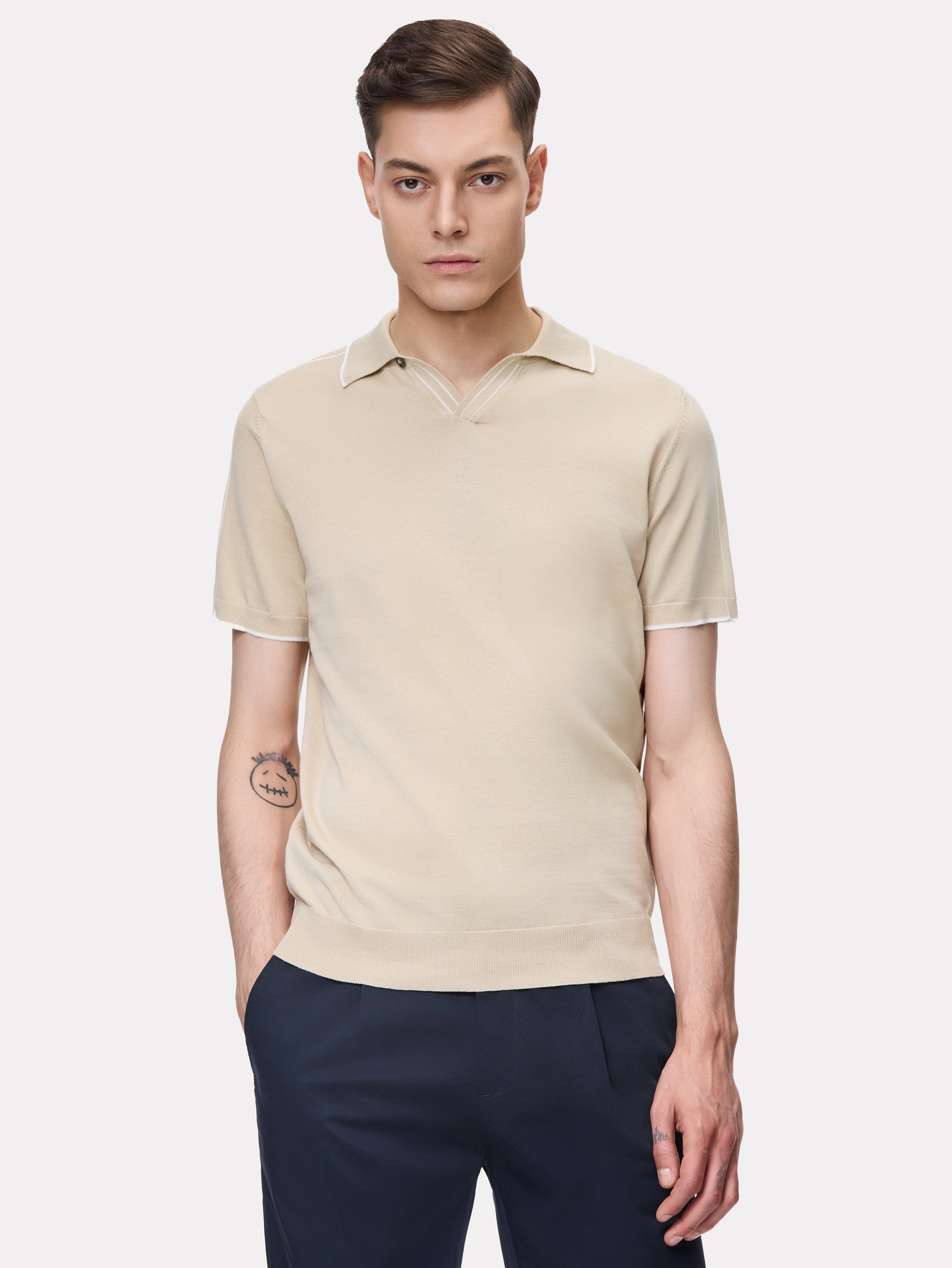 Beige polo shirt with white stripes