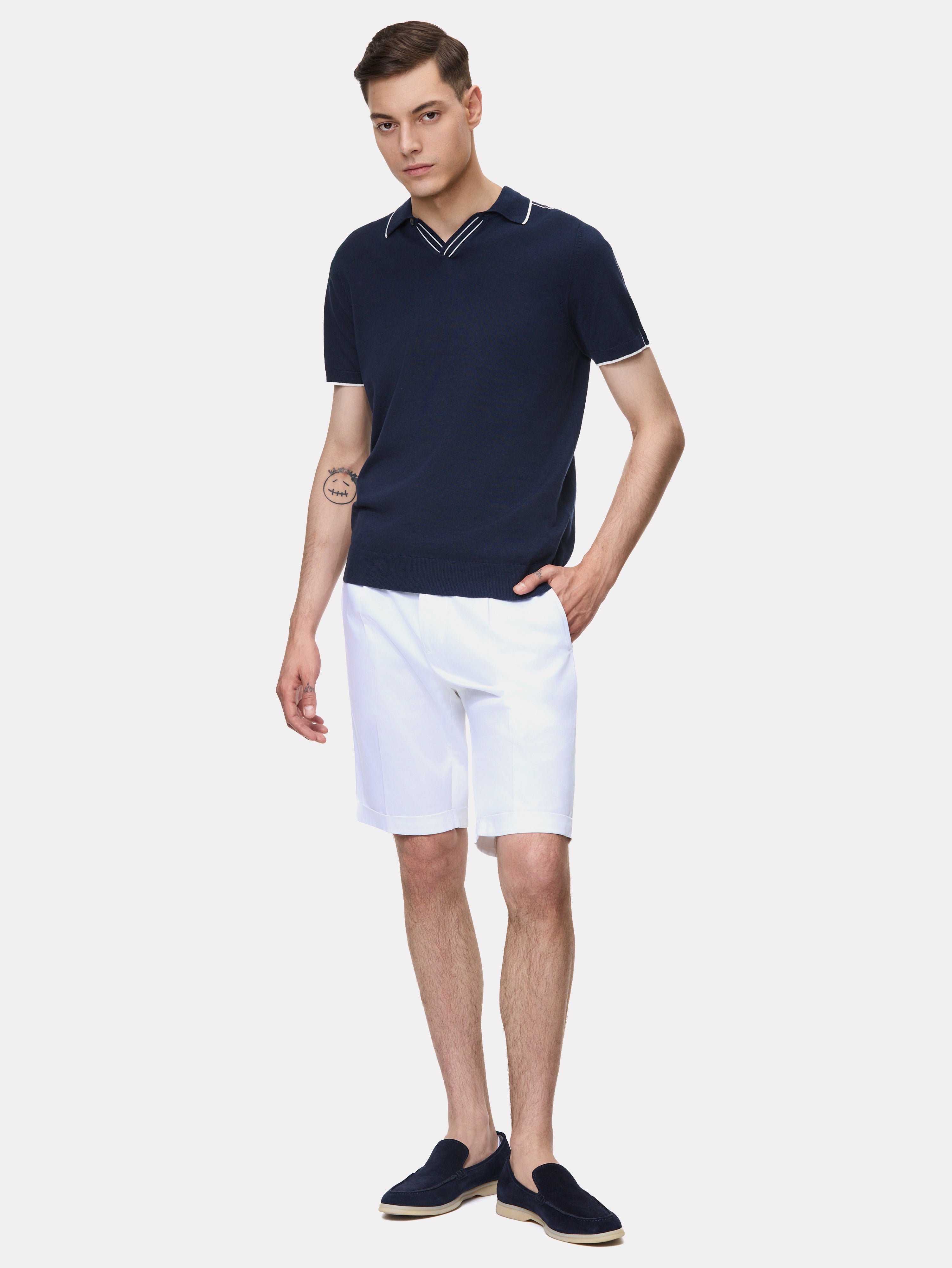 Navy polo shirt with white stripes