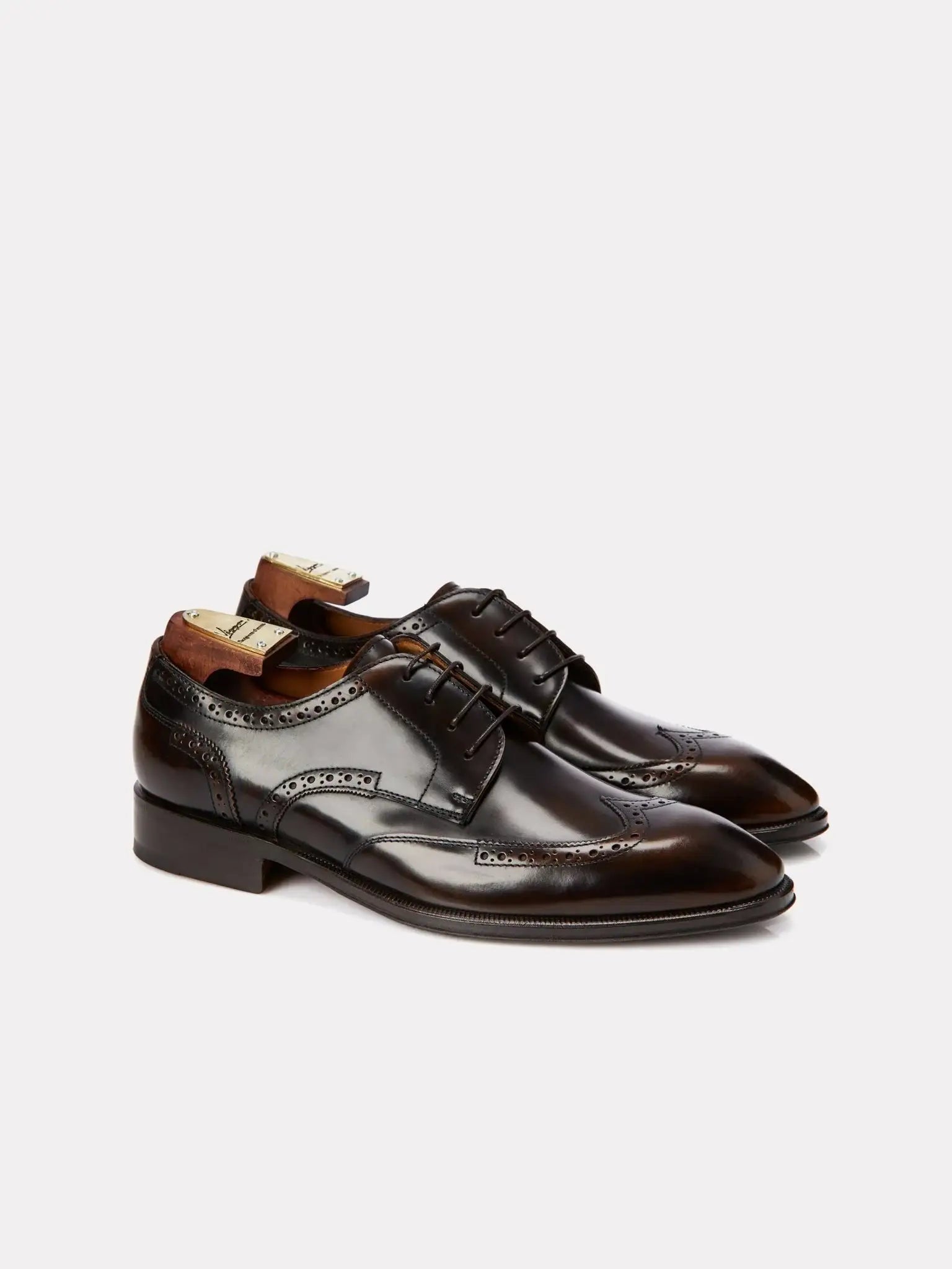 Brown derby shoes with brogue details