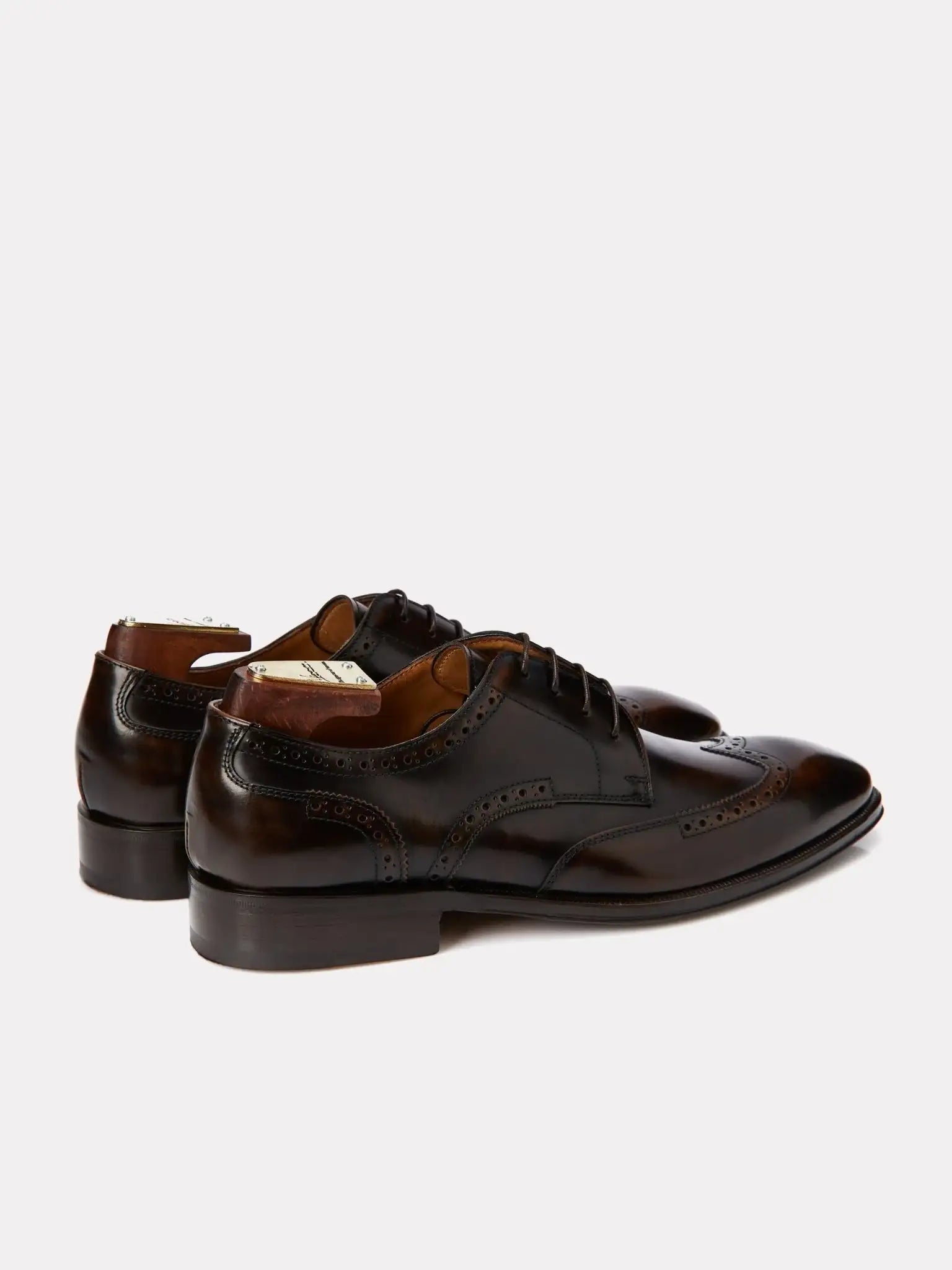 Brown derby shoes with brogue details