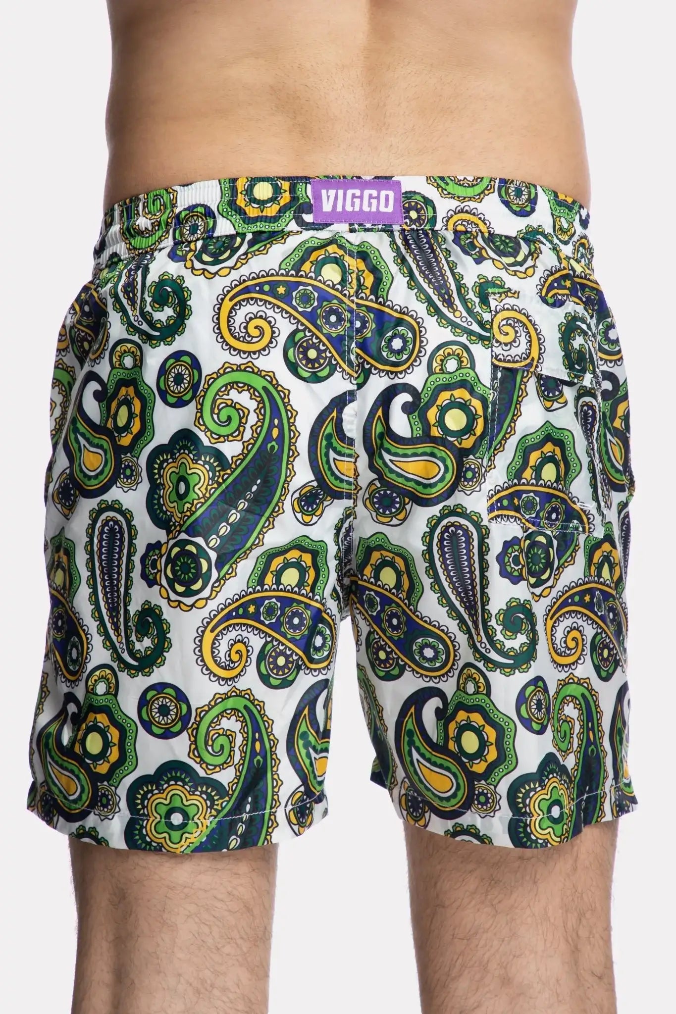 Green and purple swimming shorts