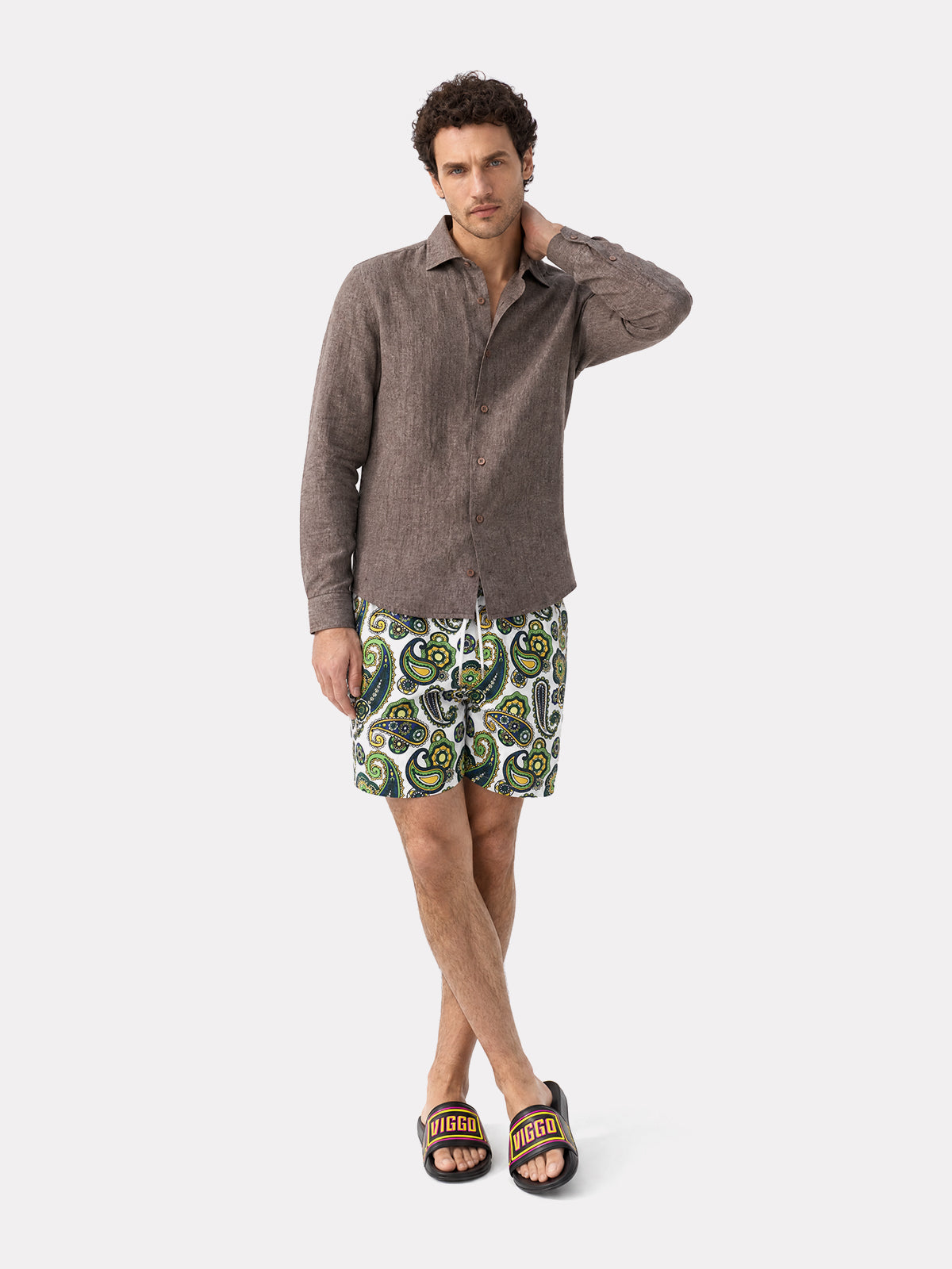 Green and purple swimming shorts