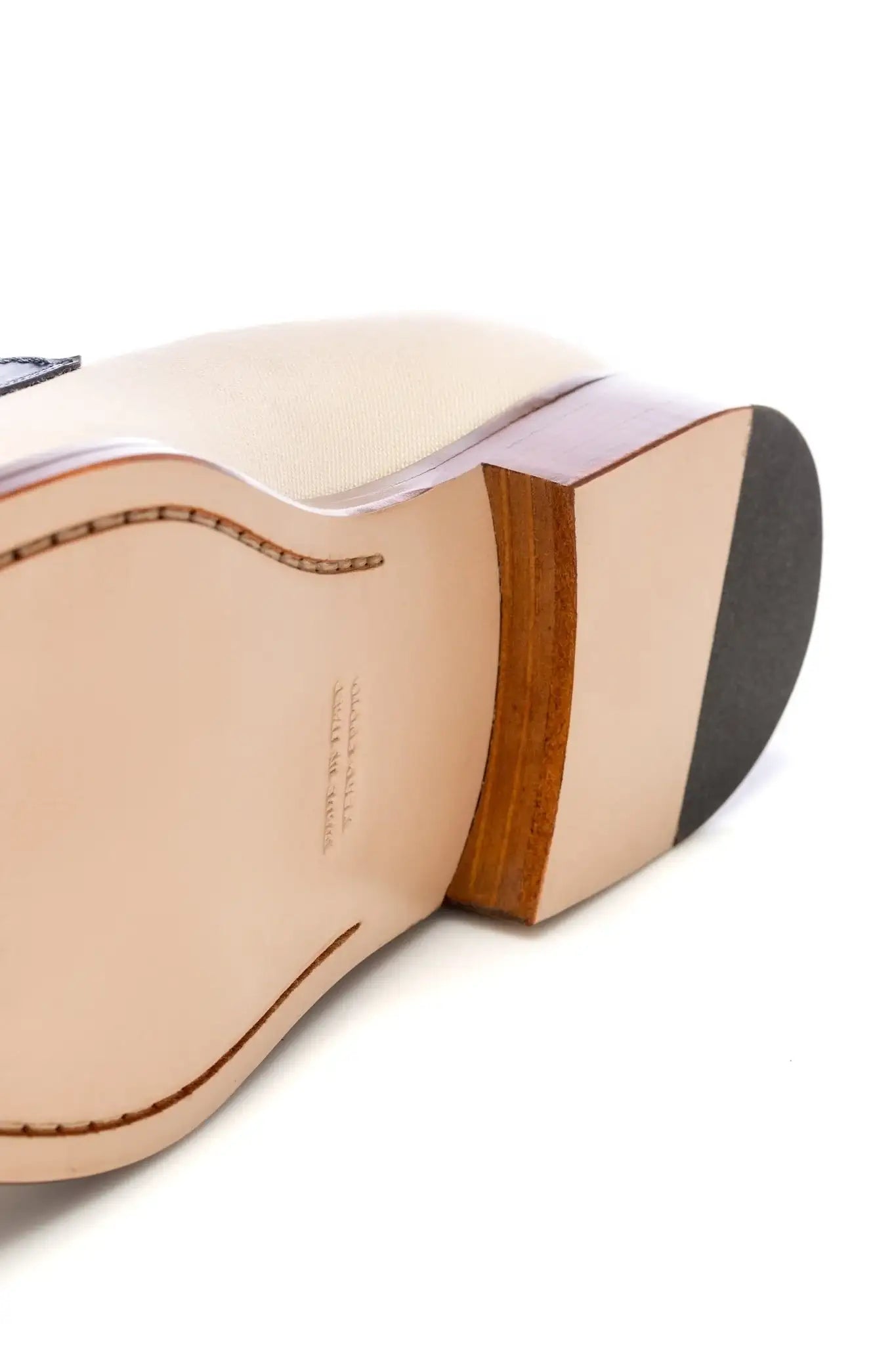 Two-tone leather and textile tassel moccasins