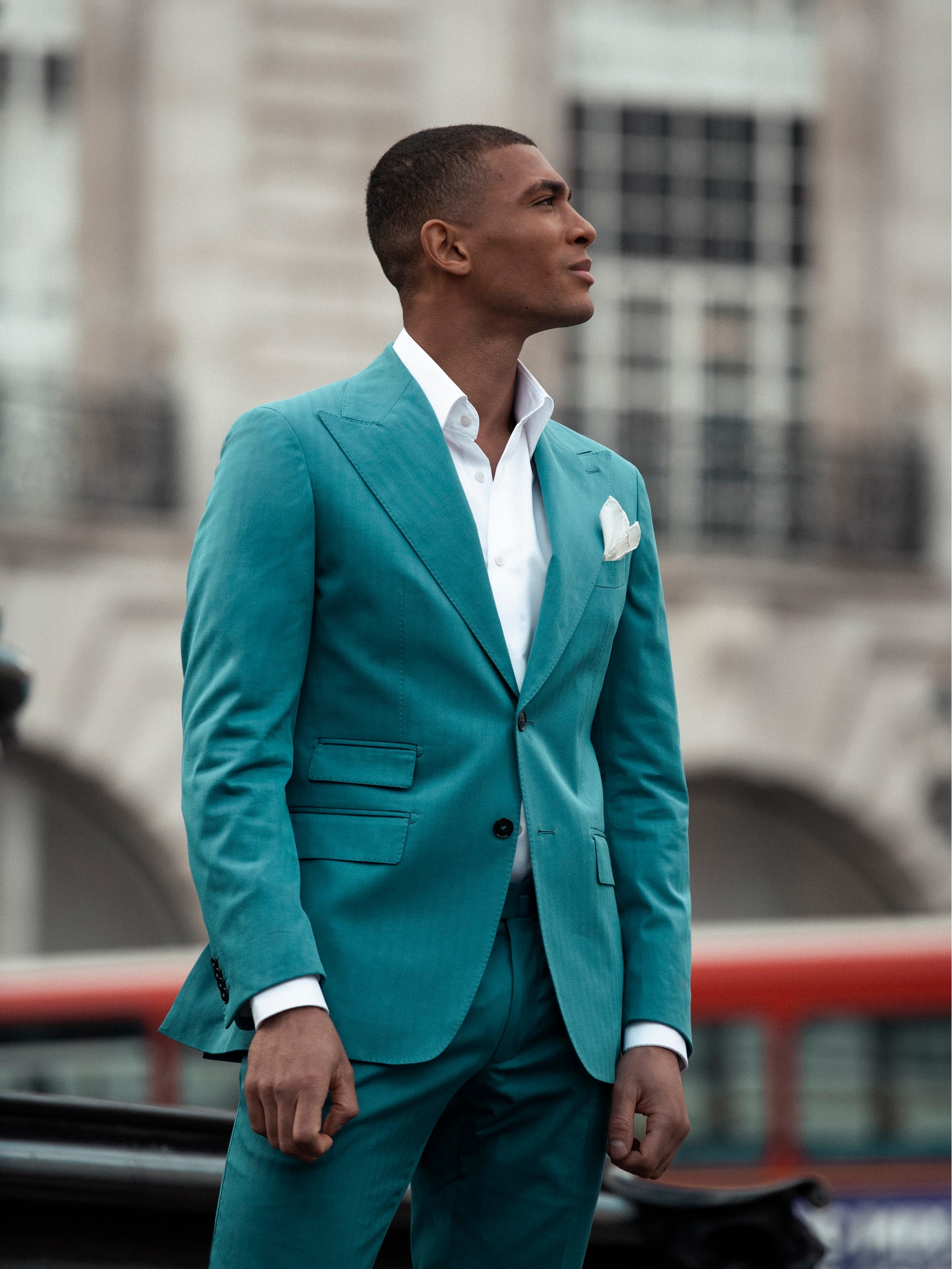 Two-piece turquoise suit with tone-on-tone stripes, tailored fit