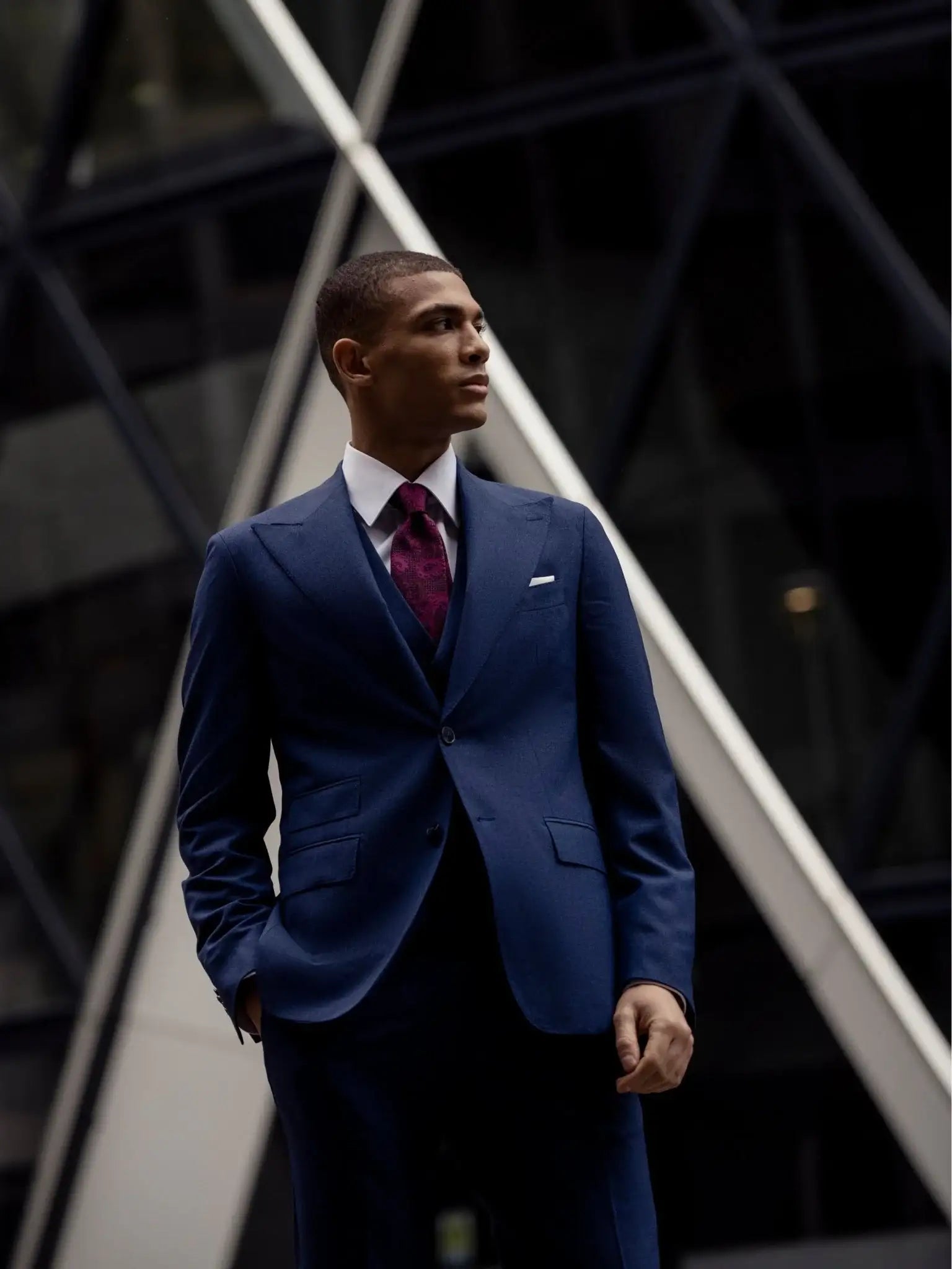 Navy textured three-piece suit, tailored fit