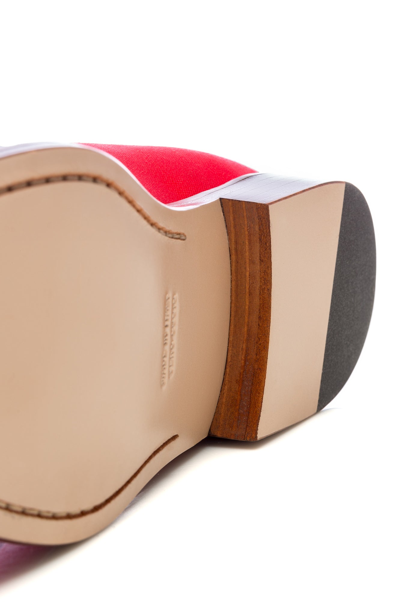 Red tassel moccasins in leather and textile