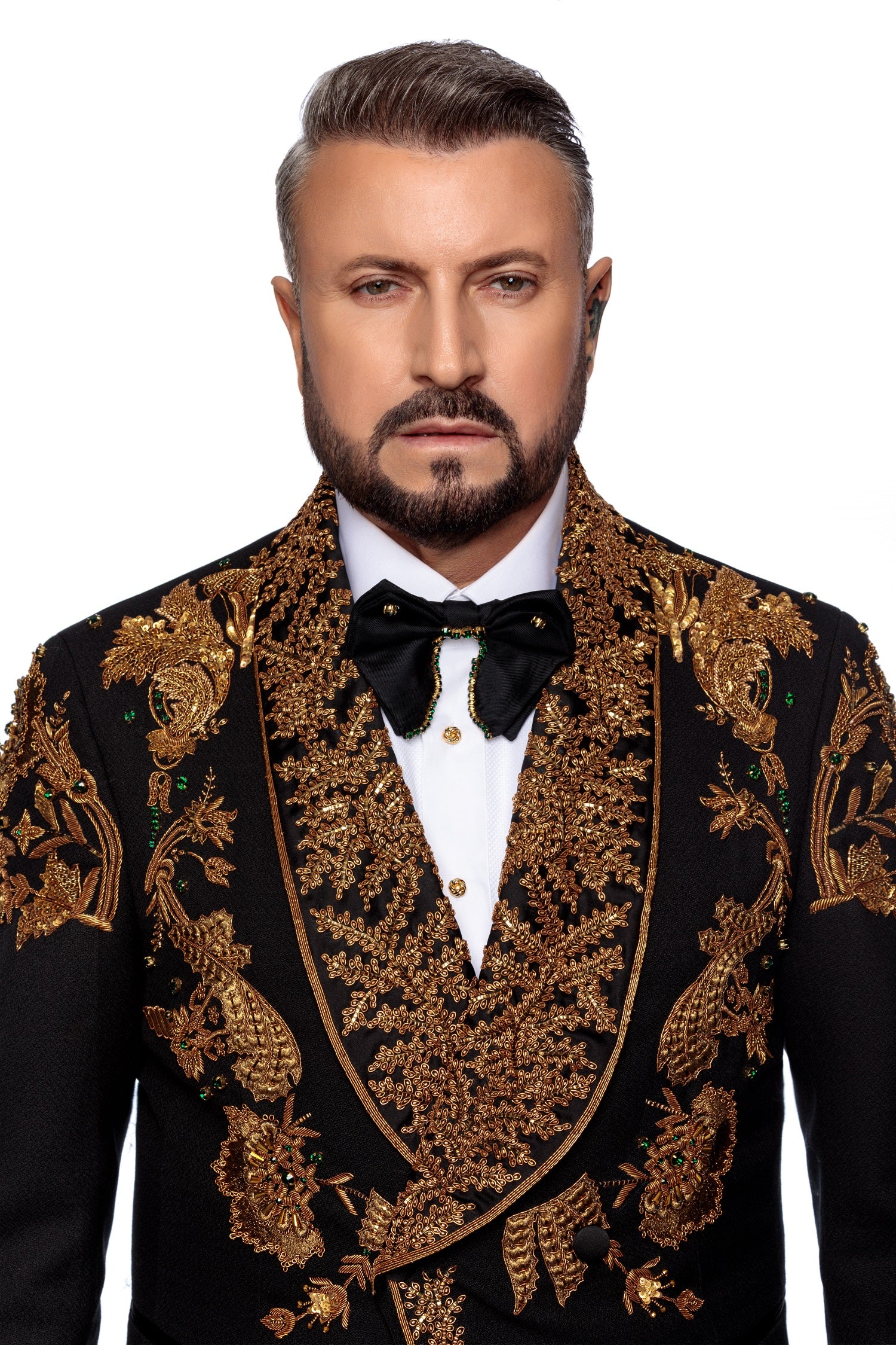 Wool tuxedo jacket with manual bronze embroidery on two rows of buttons