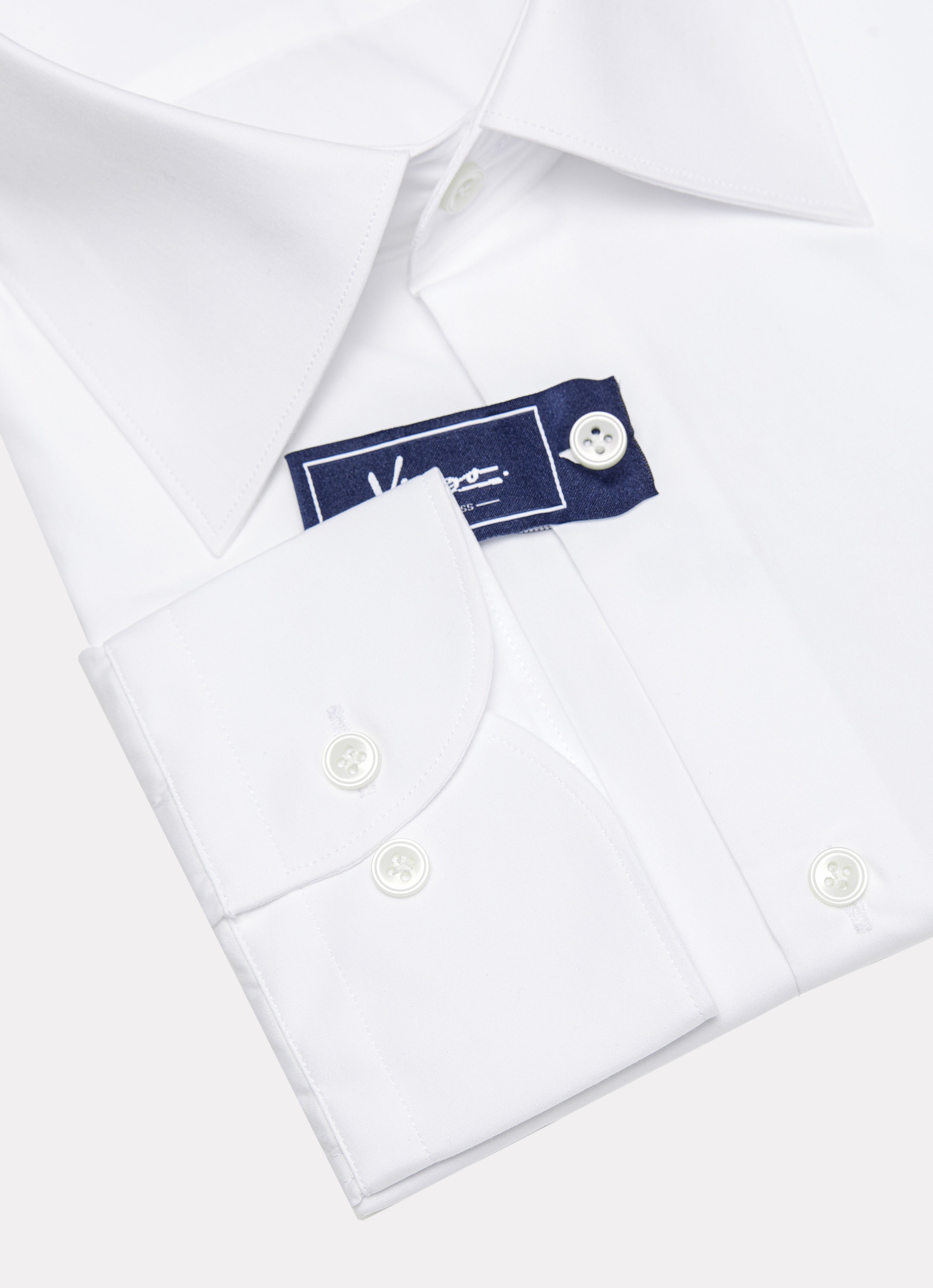 White shirt with blue embroidery