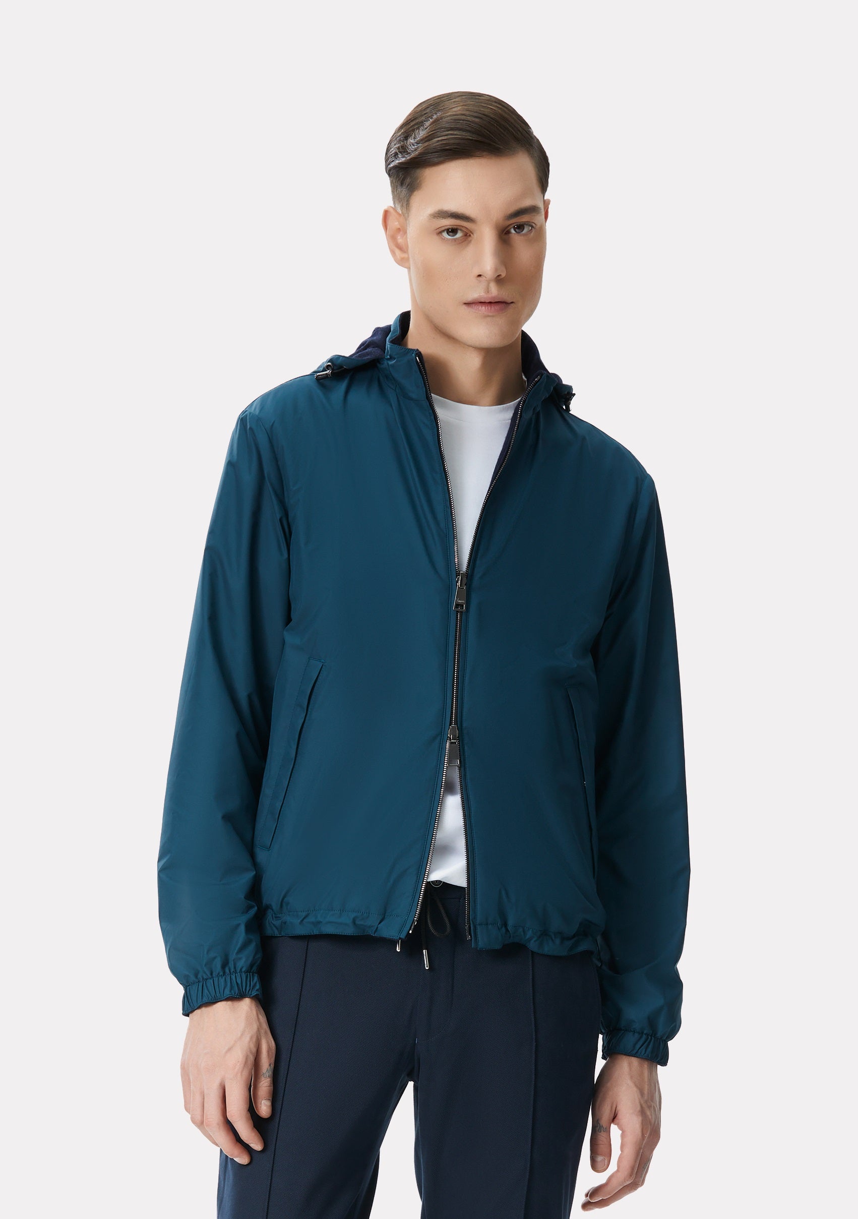 Dark turquoise/navy reversible jacket made of techno fabric and wool