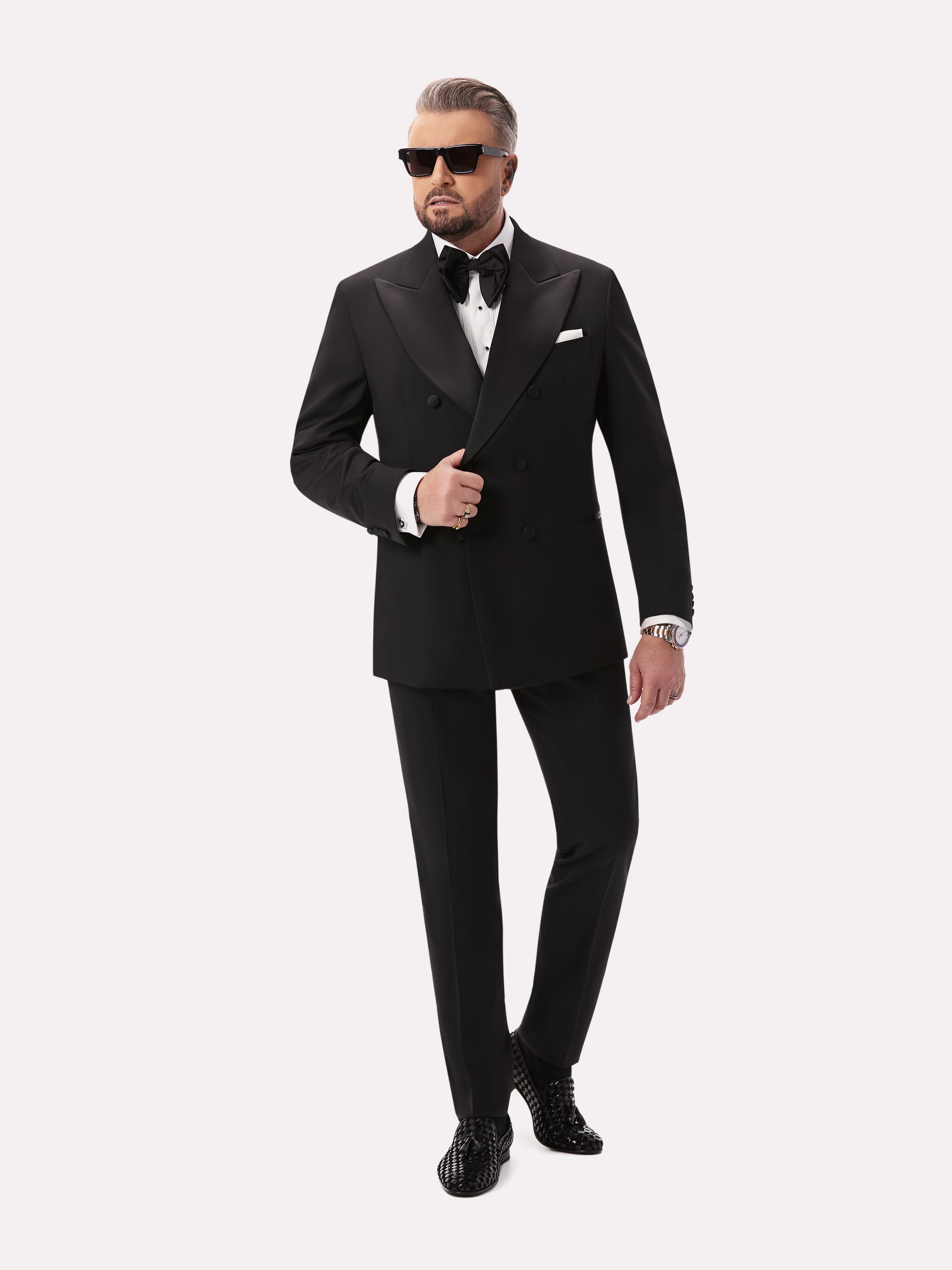 Black tuxedo jacket with two rows of buttons