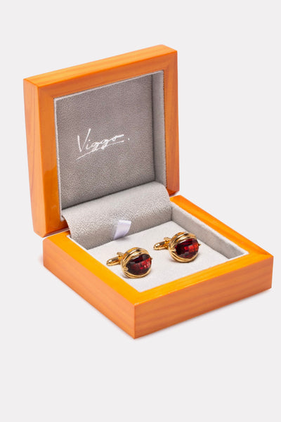 Golden buttons with cognac stone