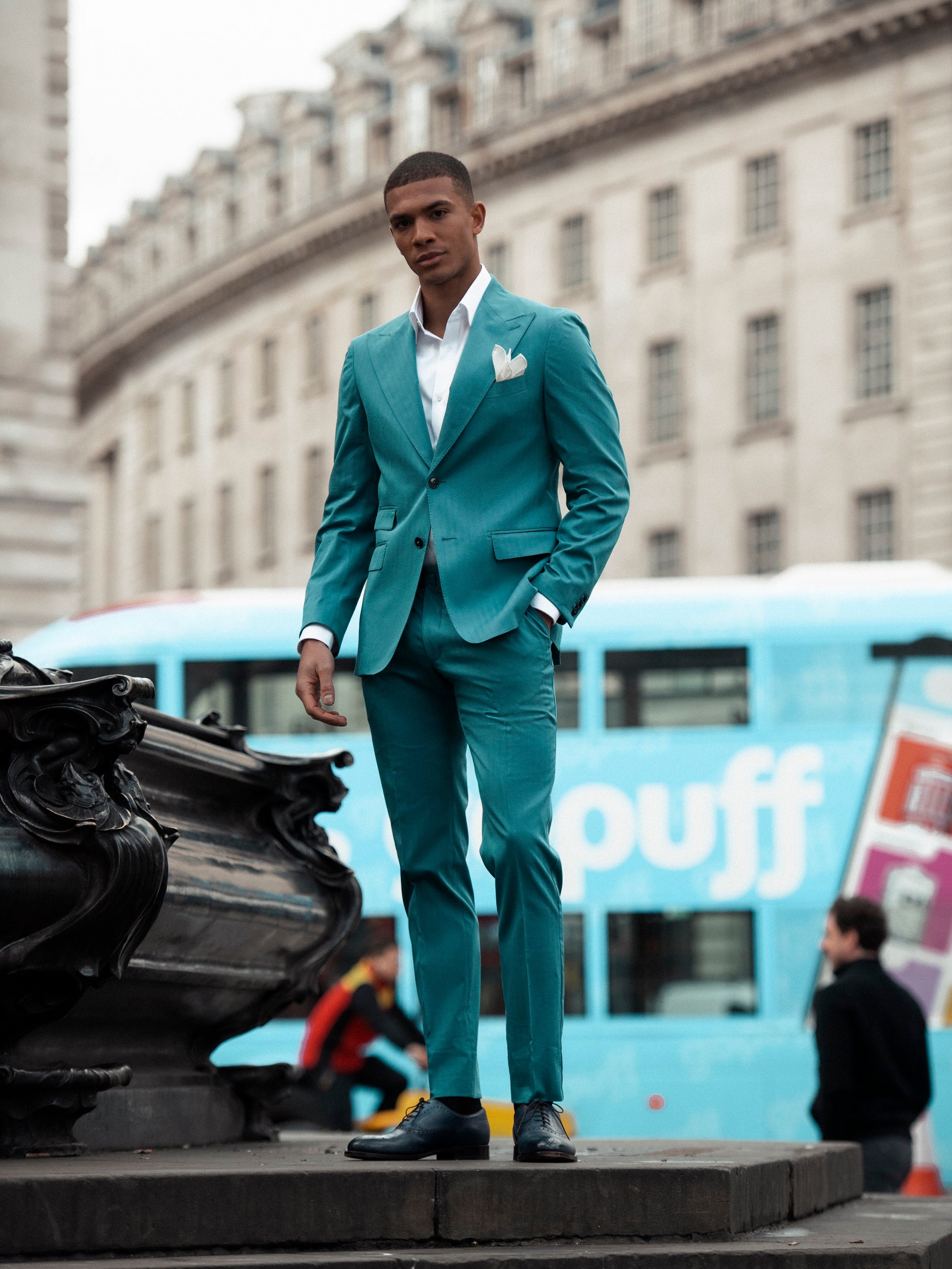 Two-piece turquoise suit with tone-on-tone stripes, tailored fit