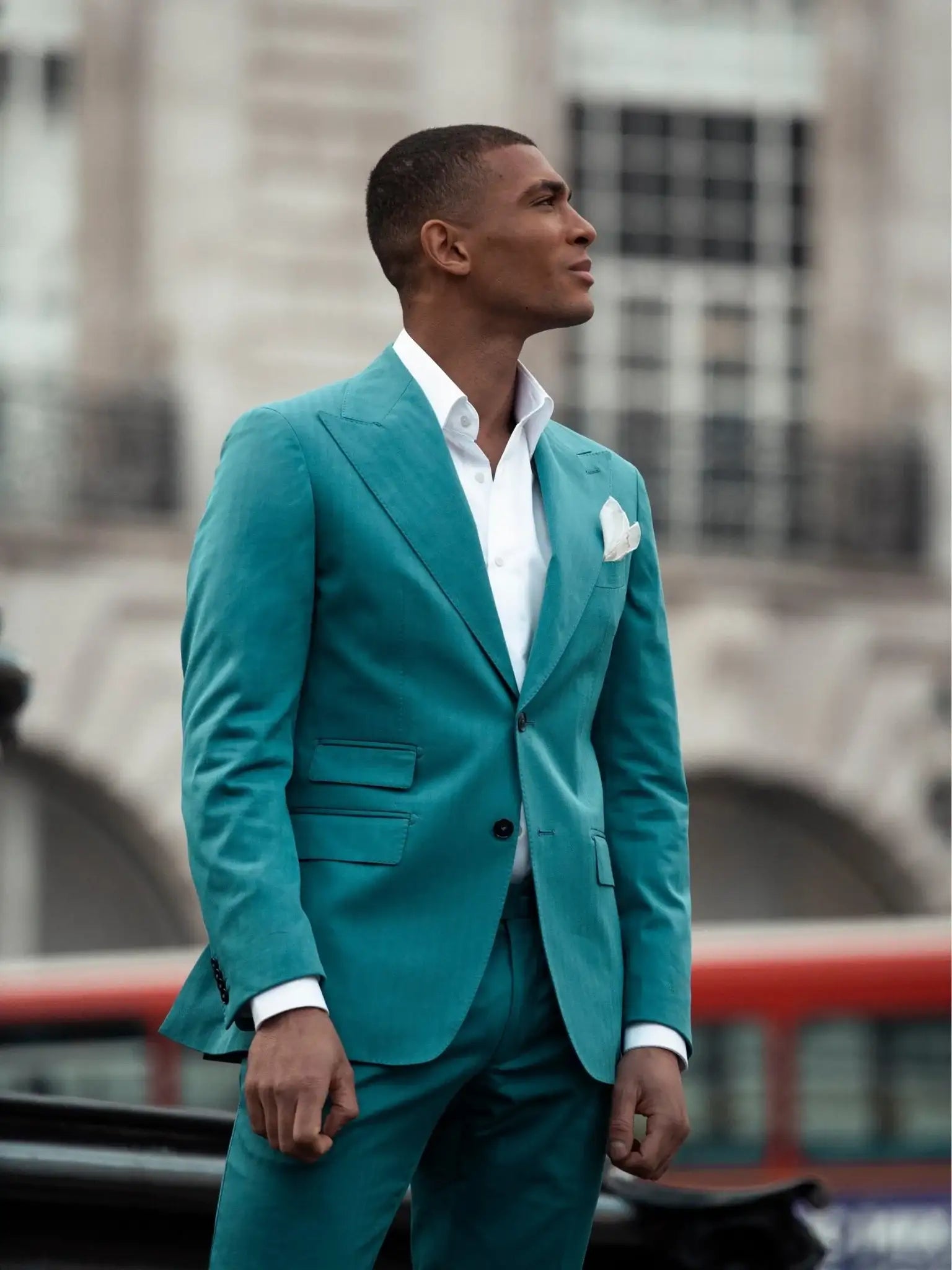 Two-piece turquoise suit with tone-on-tone stripes, tailored fit