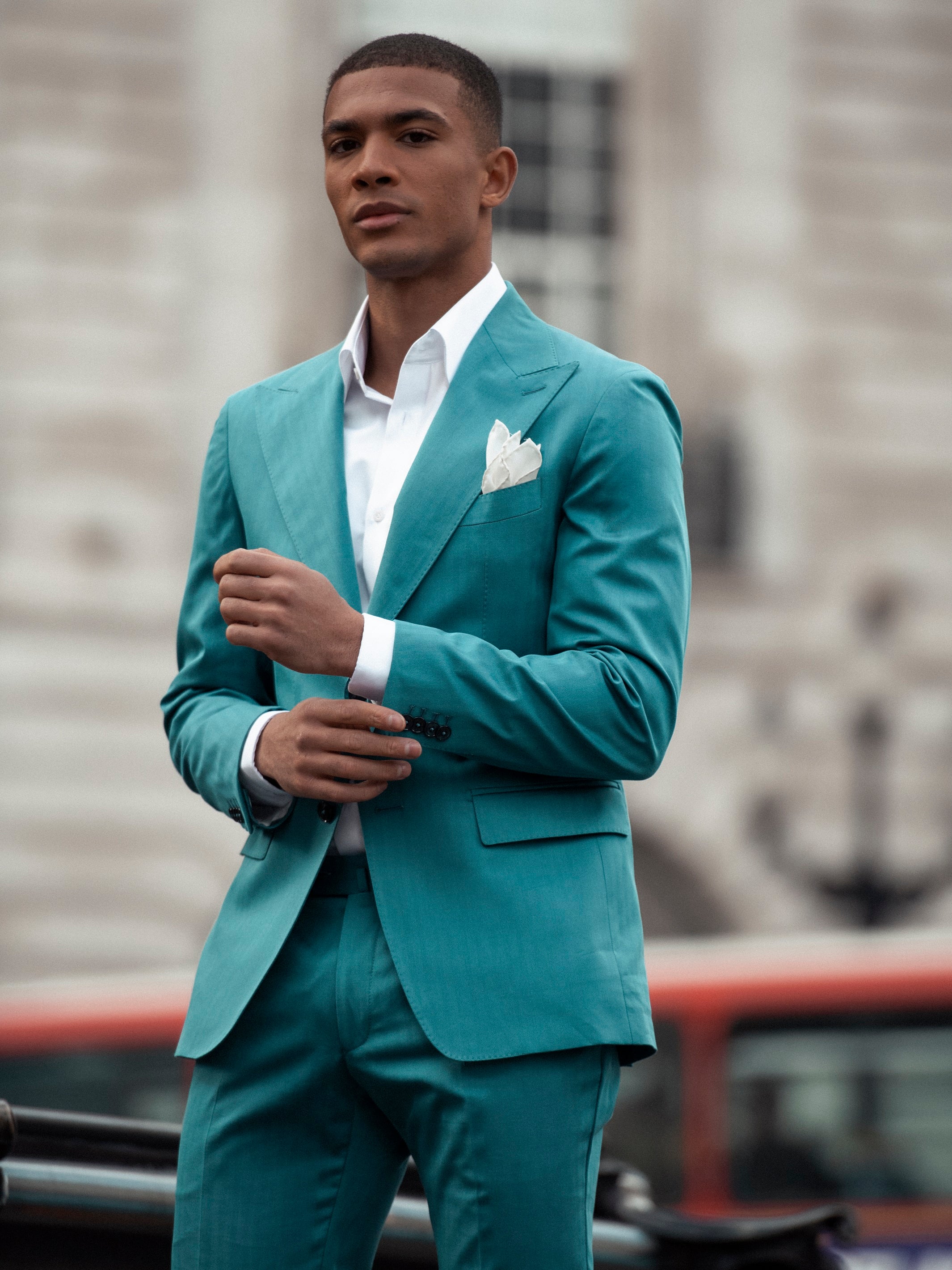 Two-piece turquoise suit with tone-on-tone stripes, tailored fit