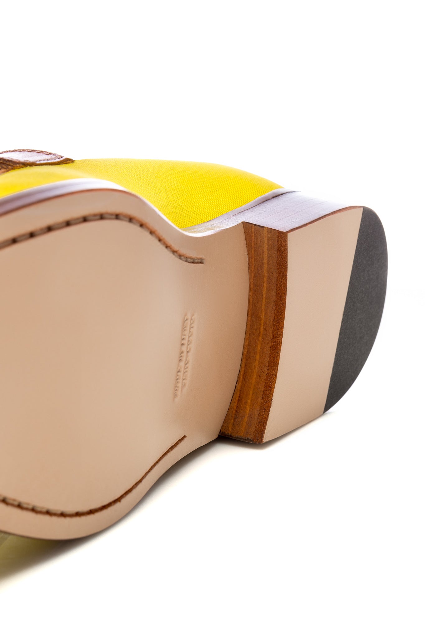 Yellow leather and textile tassel moccasins