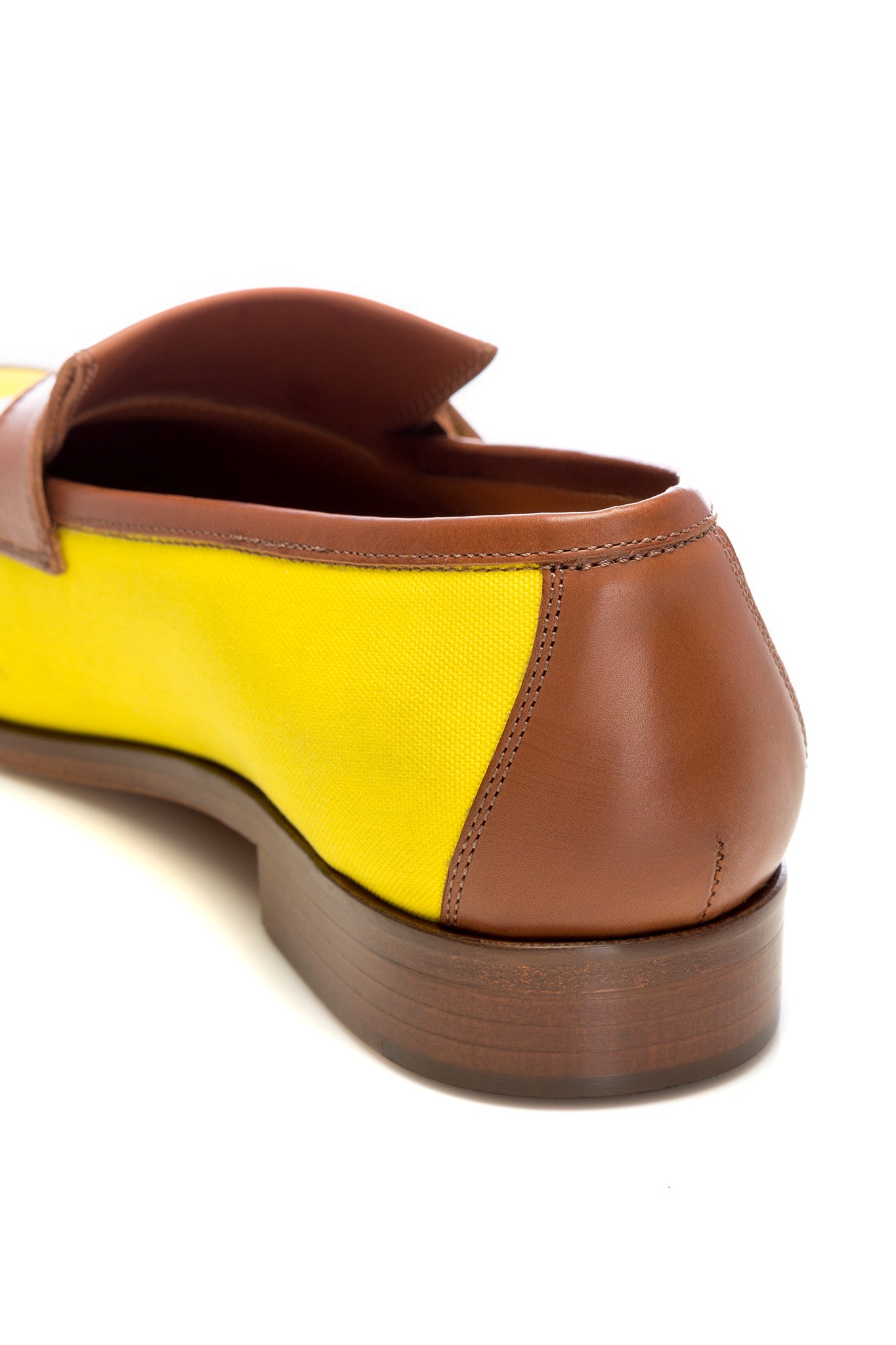 Yellow leather and textile tassel moccasins