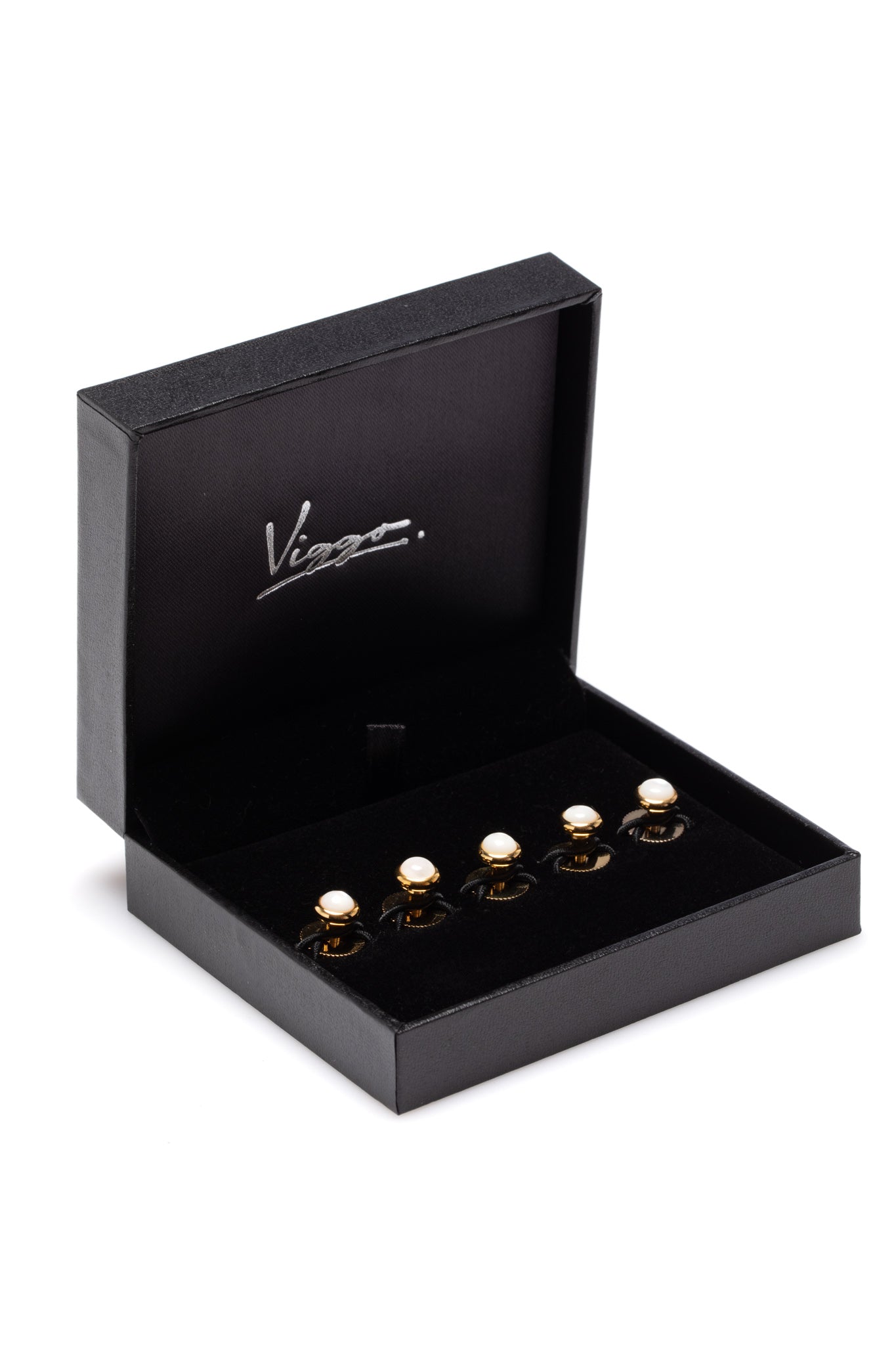 Set of golden buttons with white stone