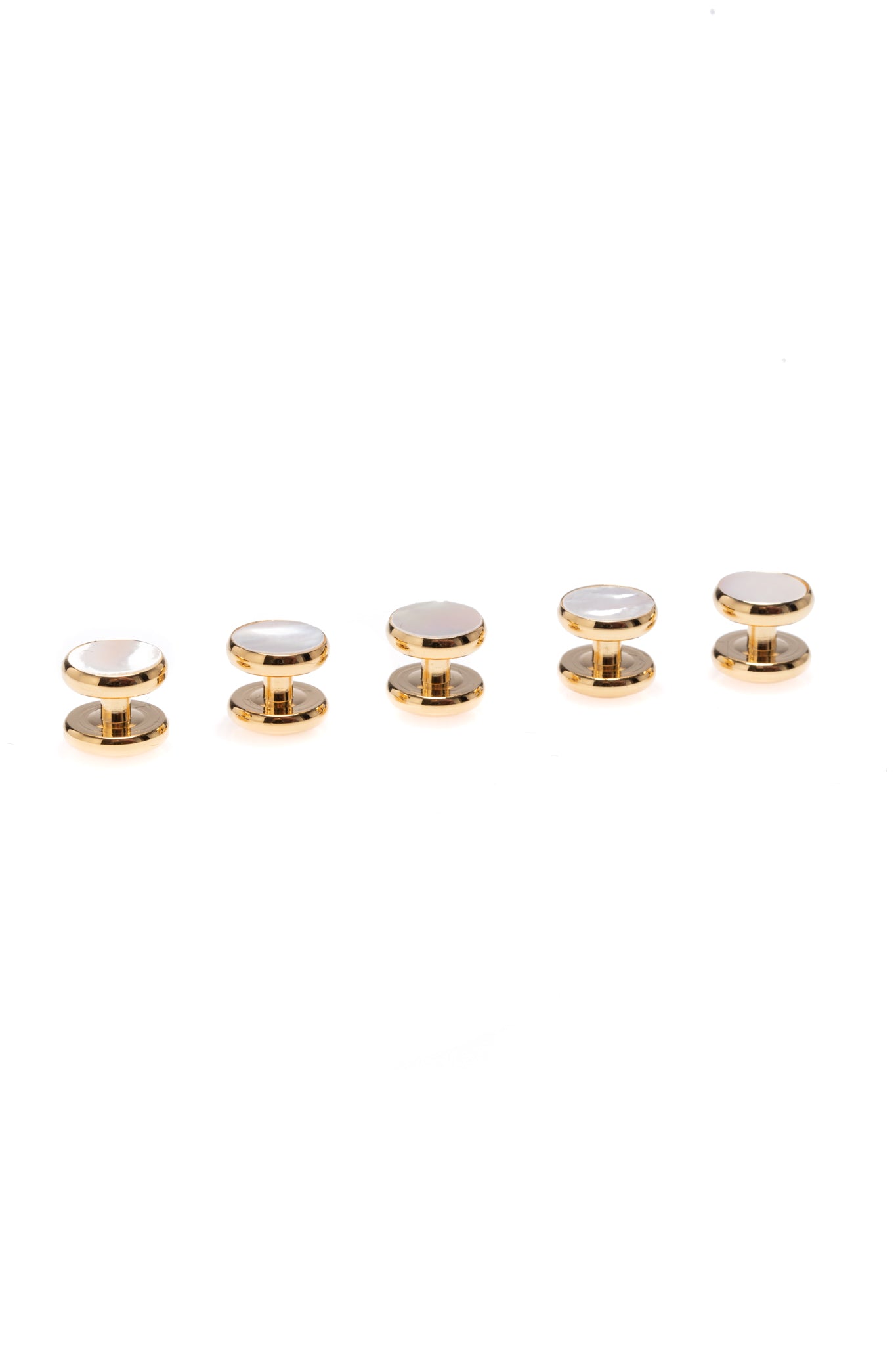 Set of golden cufflinks and buttons with white stone