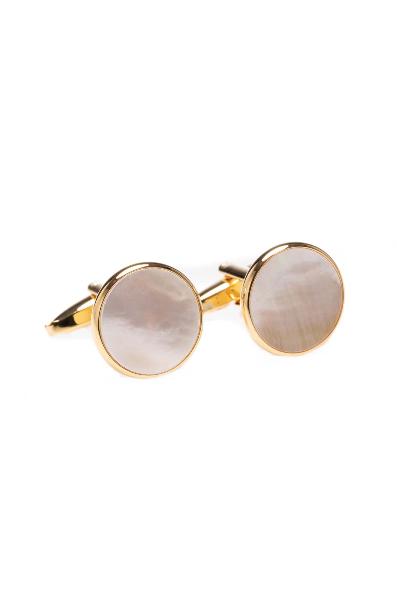 Set of golden cufflinks and buttons with white stone