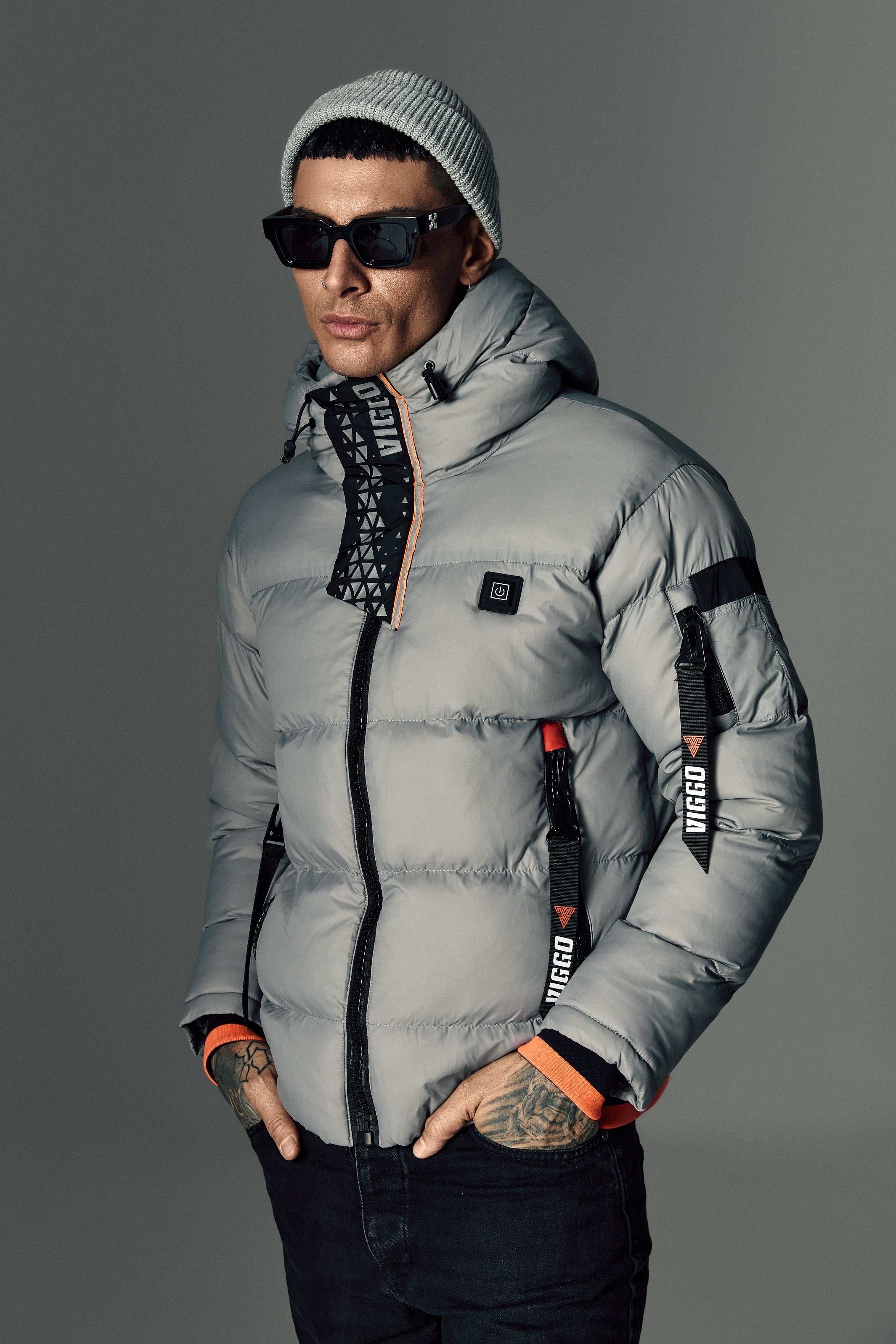 Gray jacket with heating and removable accessories