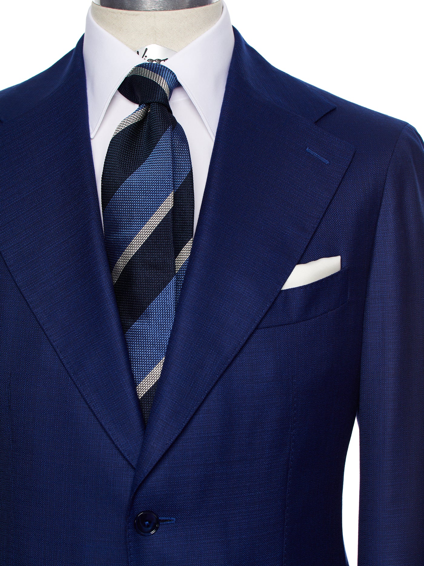 Navy blue two-piece suit with fine texture, tailored fit