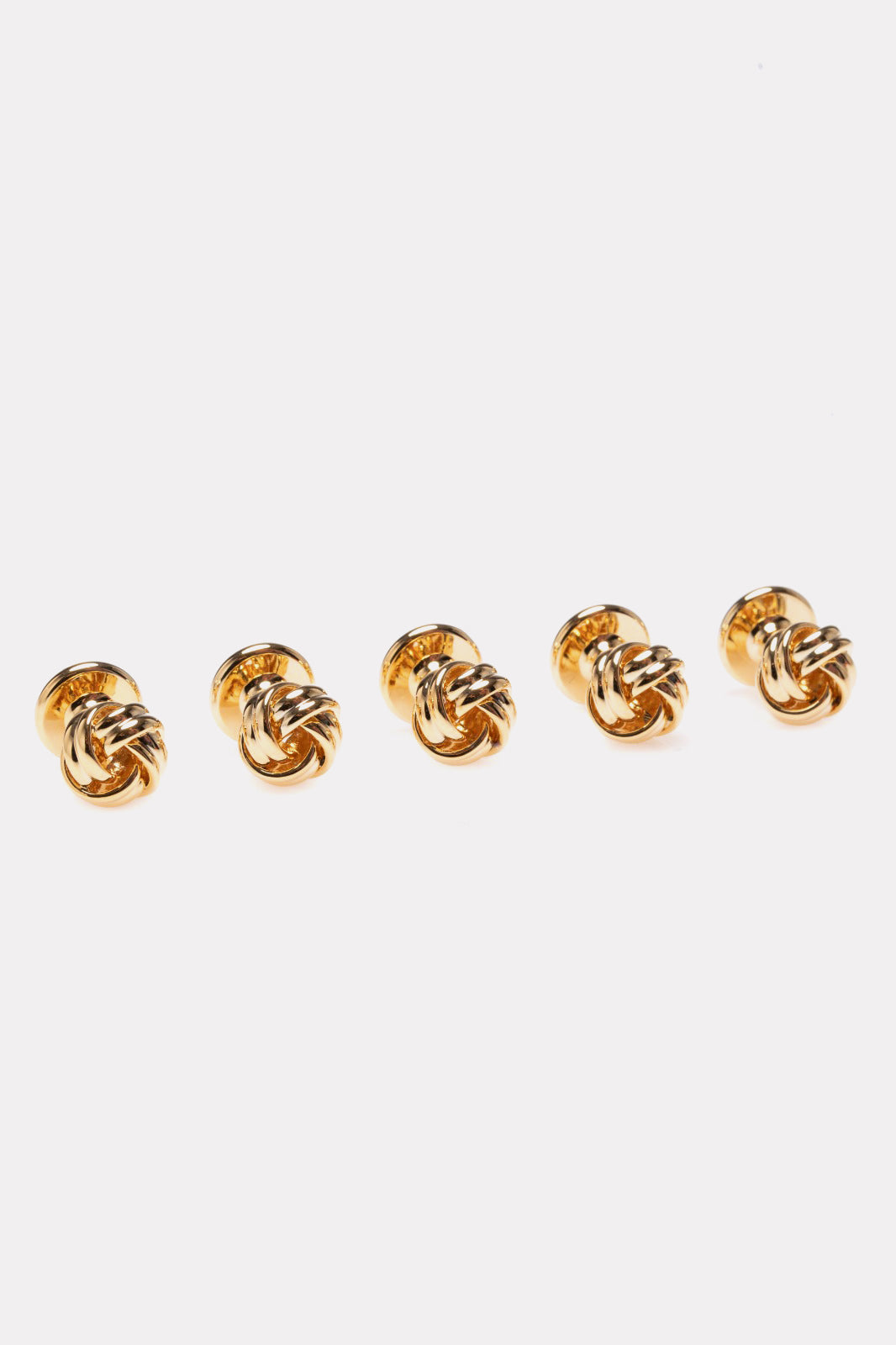 Set of golden knot buttons